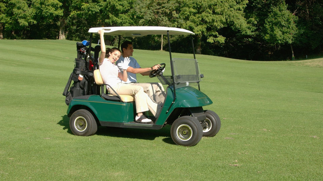 People in a golf cart