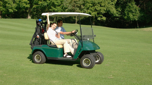 People in a golf cart